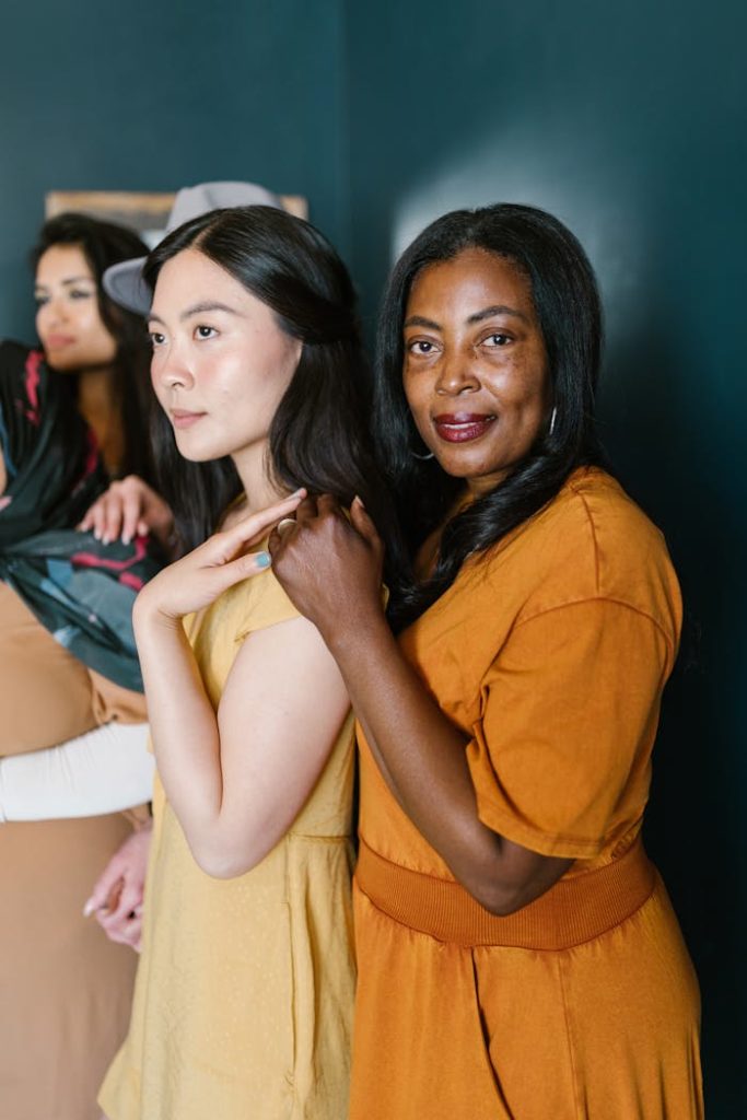 A Diverse Group of Women Posing Together for a Picture 